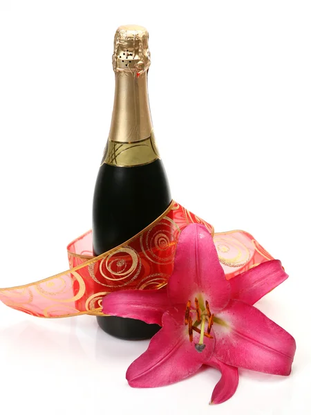 Şampanya ve çiçek — Stok fotoğraf