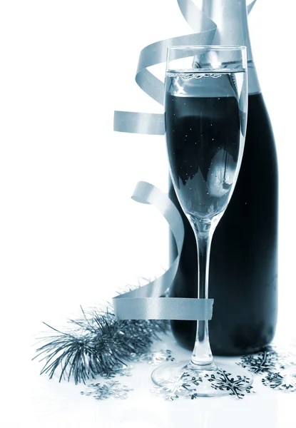 Champagne and New Year's ornaments Royalty Free Stock Photos