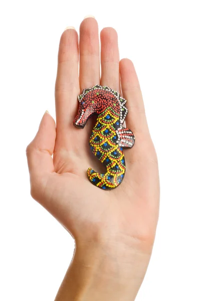 Brooch in hand — Stock Photo, Image