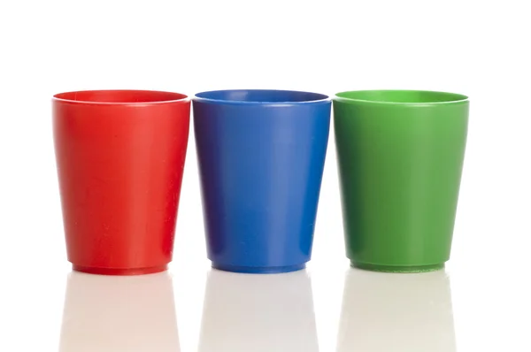 Három színes műanyag, gyűszű — Stock Fotó