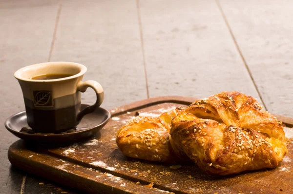 Bakery foodstuffs with coffee — Stock Photo, Image