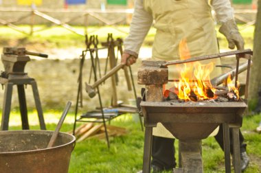 Blacksmith working clipart