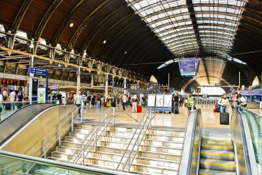 The interior of Paddington train station on May 29, 2011 in London, UK. clipart