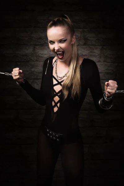 Vampire girl in a silver chains — Stock Photo, Image