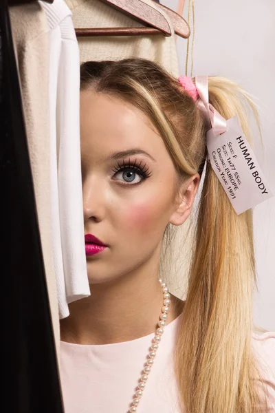 Young blonde dressed up as a doll — Stock Photo, Image