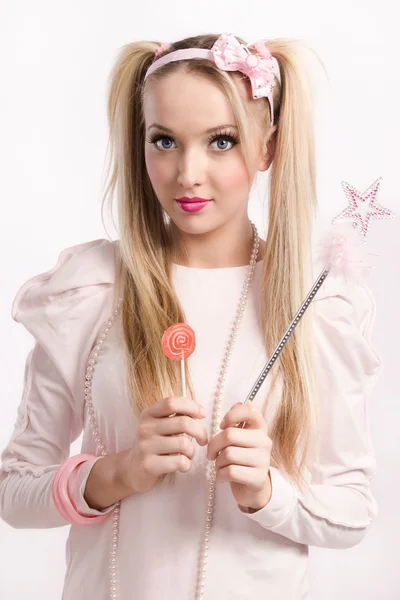 Young blonde dressed up as a doll — Stock Photo, Image