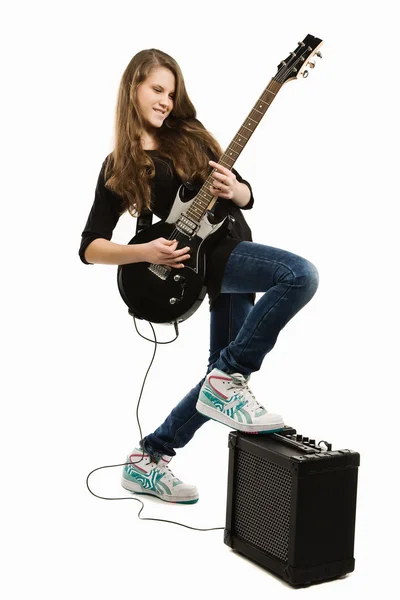 Happy teenager girl playing guitar — Stock Photo, Image