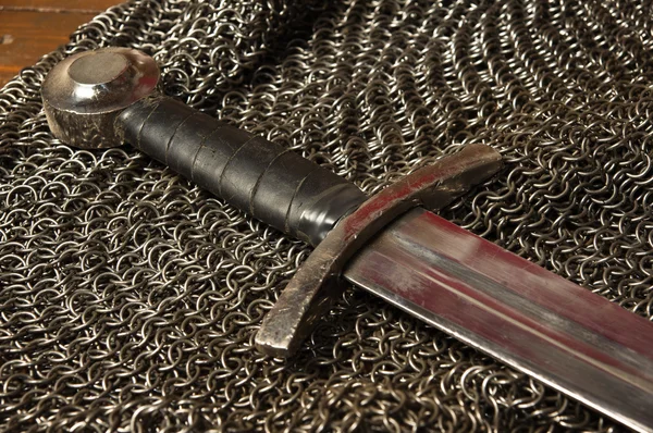 Medieval sword and hauberk — Stock Photo, Image