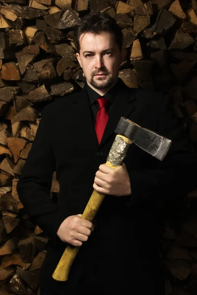 Homem de negócios com o machado — Fotografia de Stock