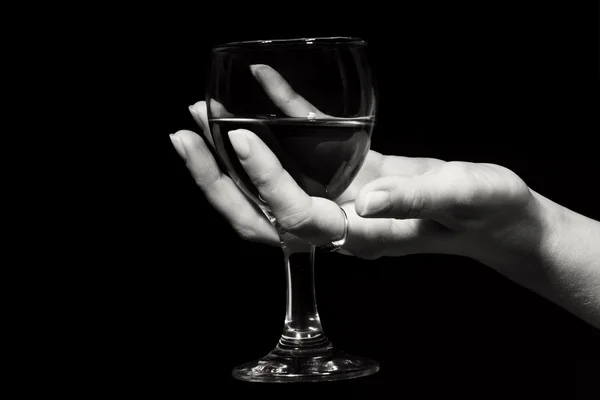 Bir el bir kırmızı şarap cam — Stok fotoğraf