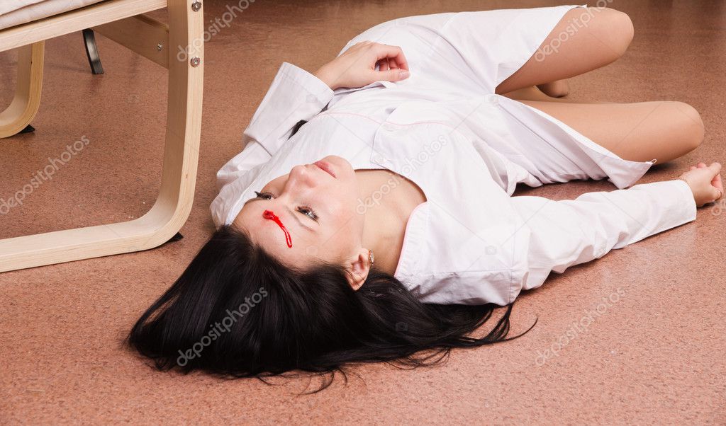 Killed nurse lying on the floor (imitation)
