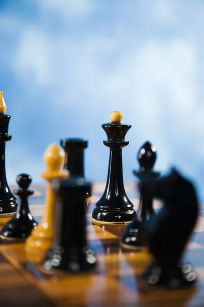 Ajedrez en un tablero de ajedrez —  Fotos de Stock