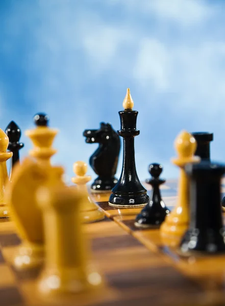 Figur na szachownicy — Zdjęcie stockowe
