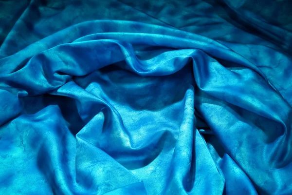 Элегантный и мягкий синий атлас — стоковое фото