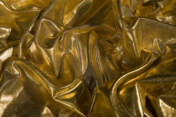 stock image Abstract gold fabric fold