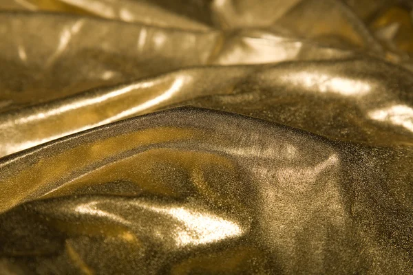 stock image Abstract gold fabric fold