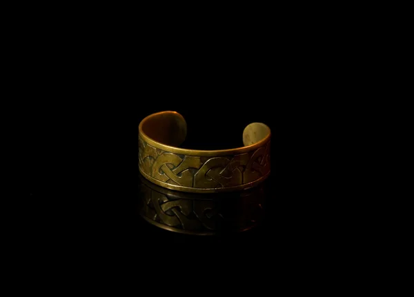 Bracelet with ancient Scandinavian designs — Stock Photo, Image