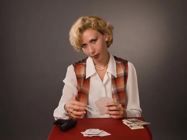 stock image The pretty woman with cards