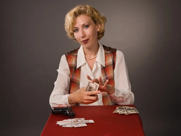 The pretty woman with cards