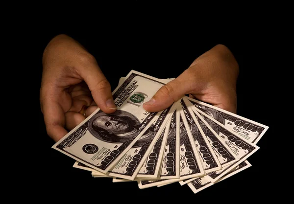 Kobiet w ręce z opakowania dolarów — Zdjęcie stockowe