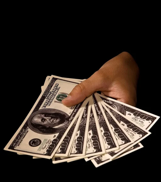 Kobiet w ręce z opakowania dolarów — Zdjęcie stockowe