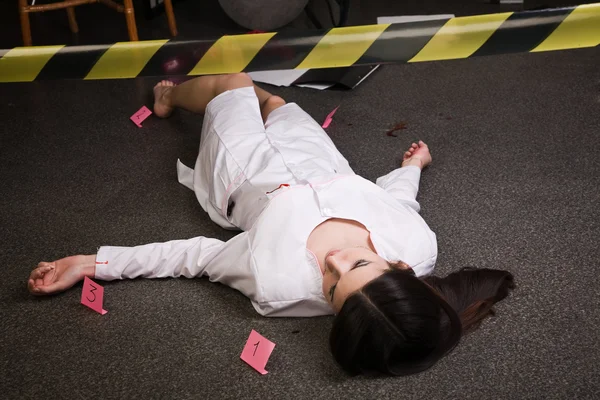 Nurse lying on the floor — Stock Photo, Image