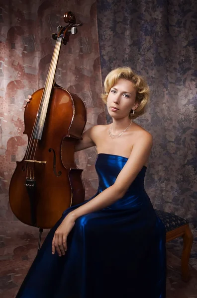 Attractive woman in evening dress with old cello — Stock Photo, Image