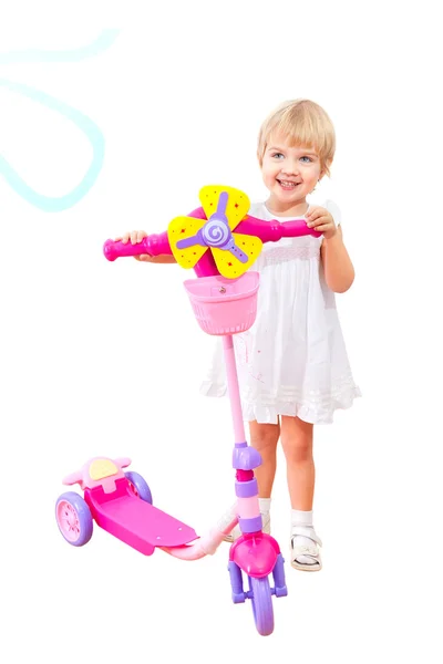 Klein meisje op scooter — Stockfoto