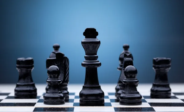 Svarta schackpjäser — Stockfoto