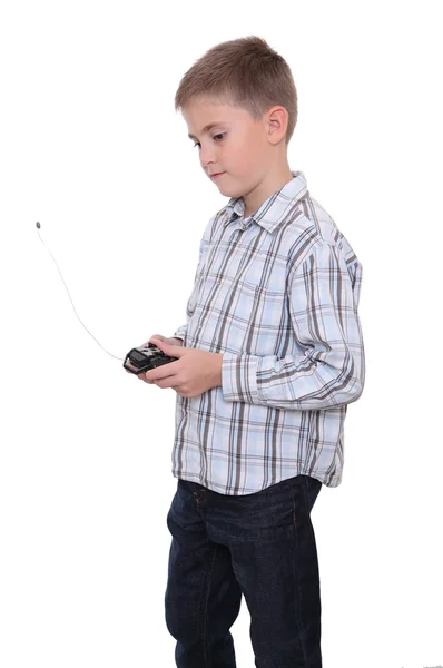 男孩与远程控制器 — 图库照片