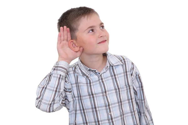 Rapaz a mostrar que está a ouvir — Fotografia de Stock