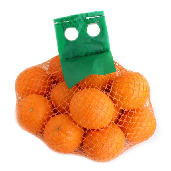 Twee kilogram van sinaasappelen in het raster. — Stockfoto