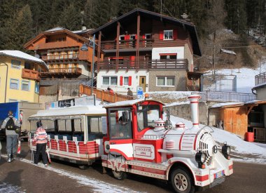Skibus in ski resort Canazei clipart