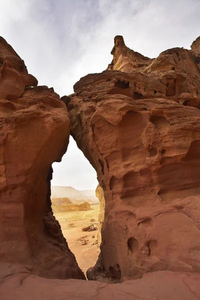 Through arch in red mountains — Stock Photo, Image