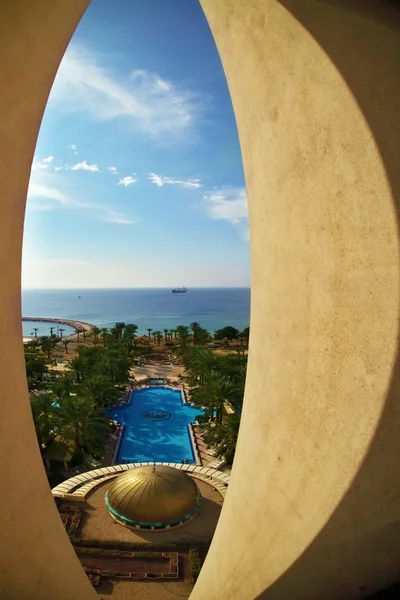 Swimming pool on coast of Red sea — Stock Photo, Image