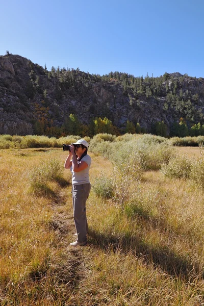 stock image A woman photographed in a valley