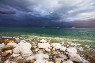 Improbable effects during a thunder-storm on the Dead Sea clipart