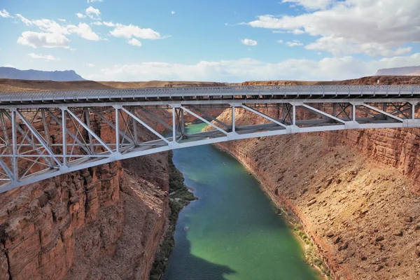 The easy metal bridge through the river Colorado — Stock Photo, Image