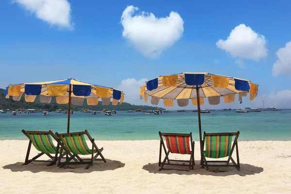 stock image Multi-colored beach umbrellas and chaise lounges