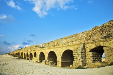 The aqueduct of the Roman period at coast clipart