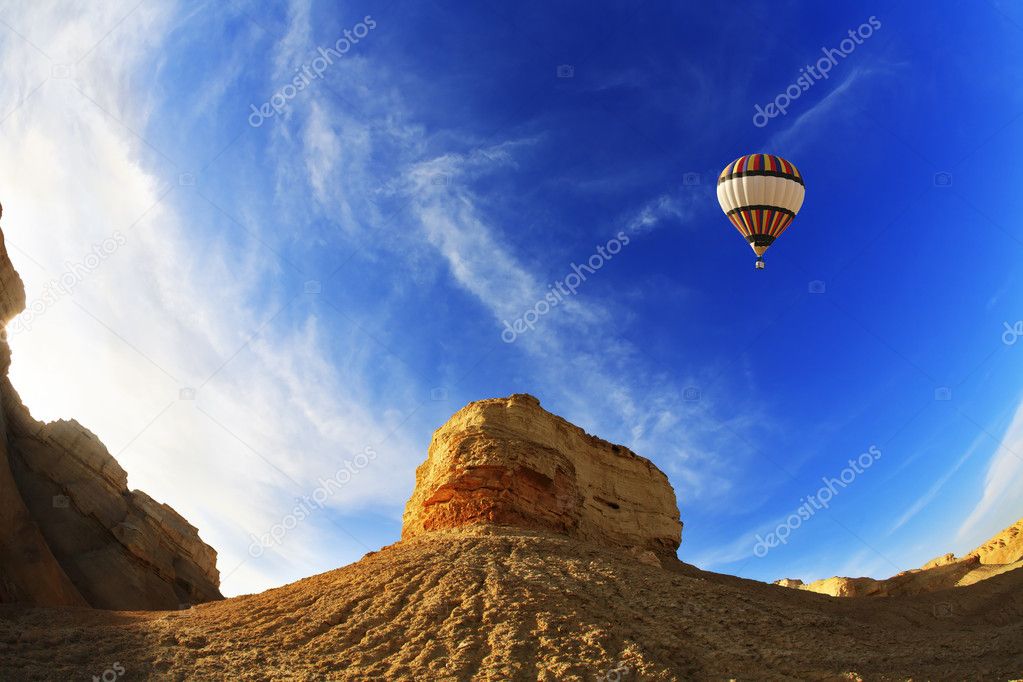 The balloon above mountains of the Dead Sea. A sunset