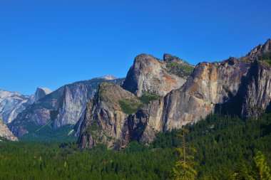 The picturesque mountain circuit shined by the sun. clipart