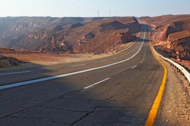 Magnificent highway in ancient mountains of Eilat clipart