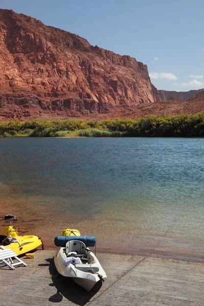 stock image Canoe on the shores of river.