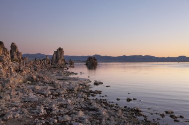 Lake shallow, in it set of picturesque reeves of the Tufa clipart
