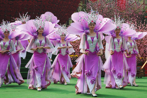 The Chinese ensemble in lilac suits