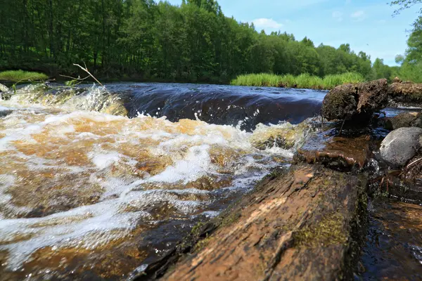 River flow on old destroyed dam — Stock Photo, Image