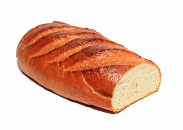 Длинный хлеб на белом фоне — стоковое фото