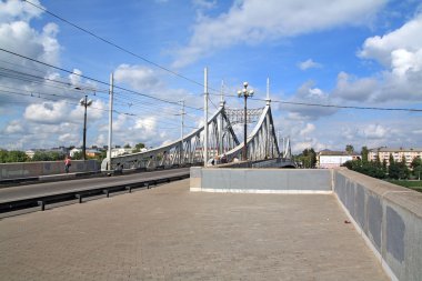 Town bridge through small river clipart