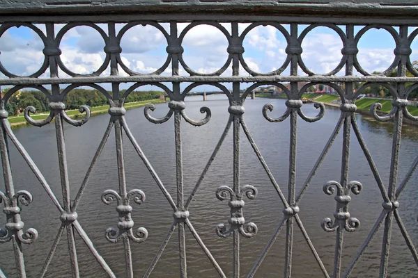 Bridge banisters through greater river — Stock Photo, Image